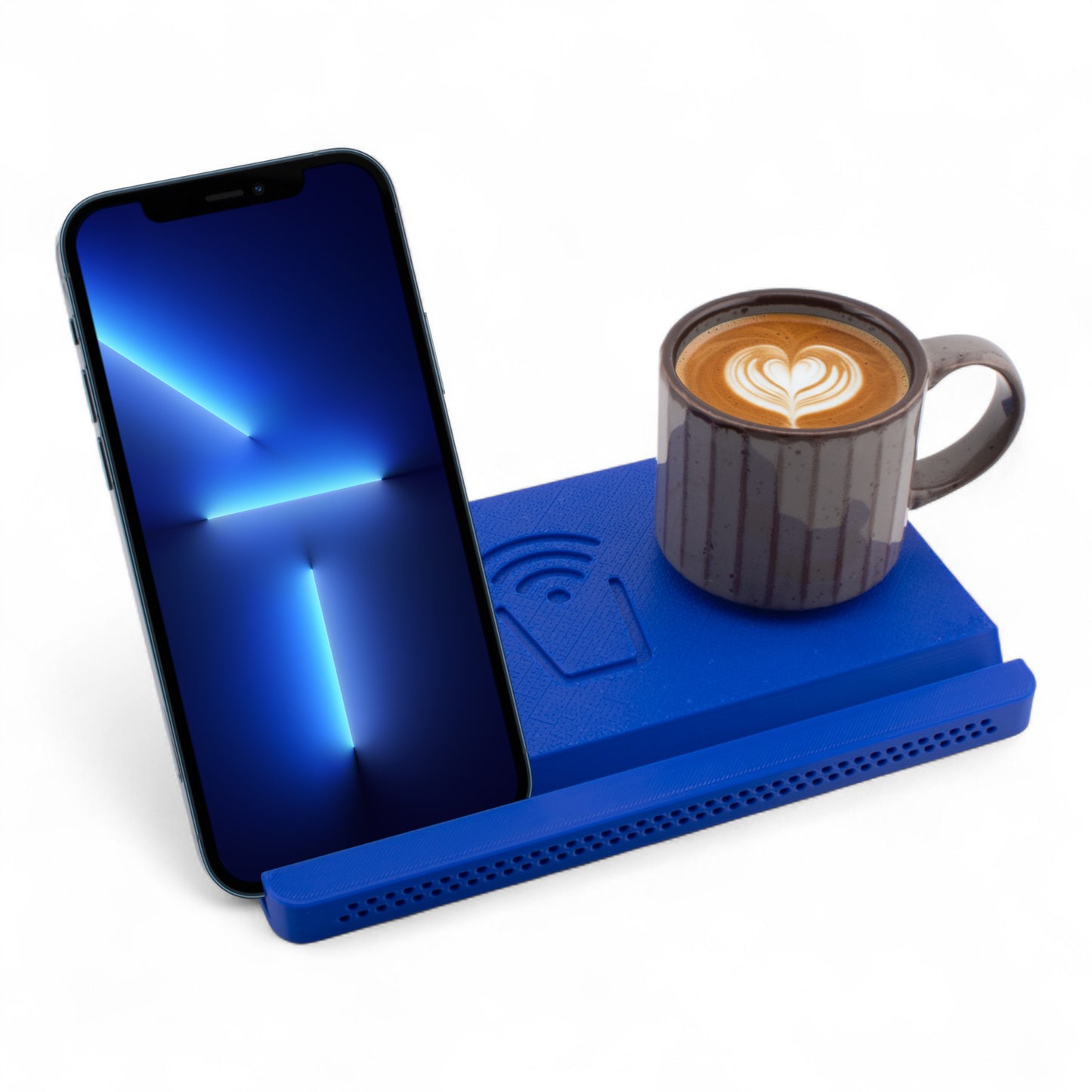 Smartphone and coffee mug on a blue coaster on a white background right angle