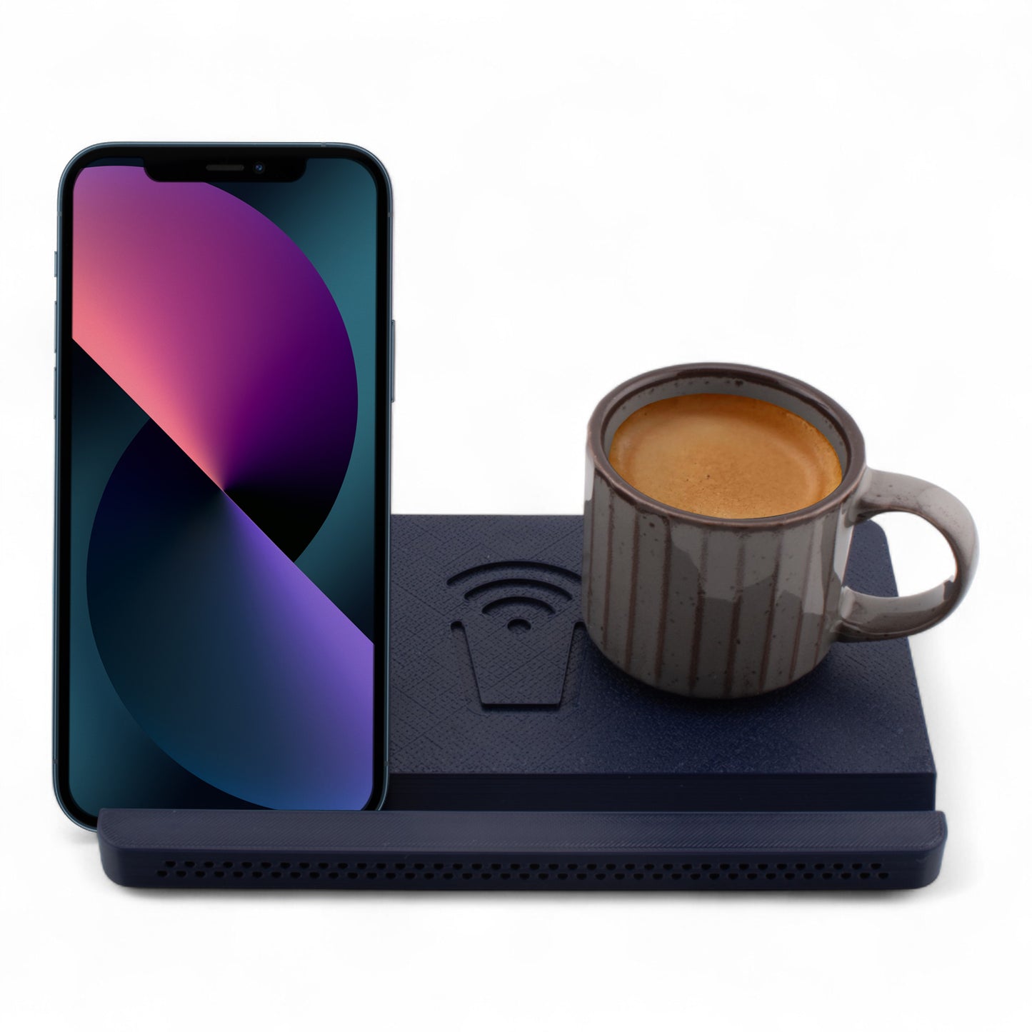 Smartphone and coffee mug on an indigo coaster on a white background front facing