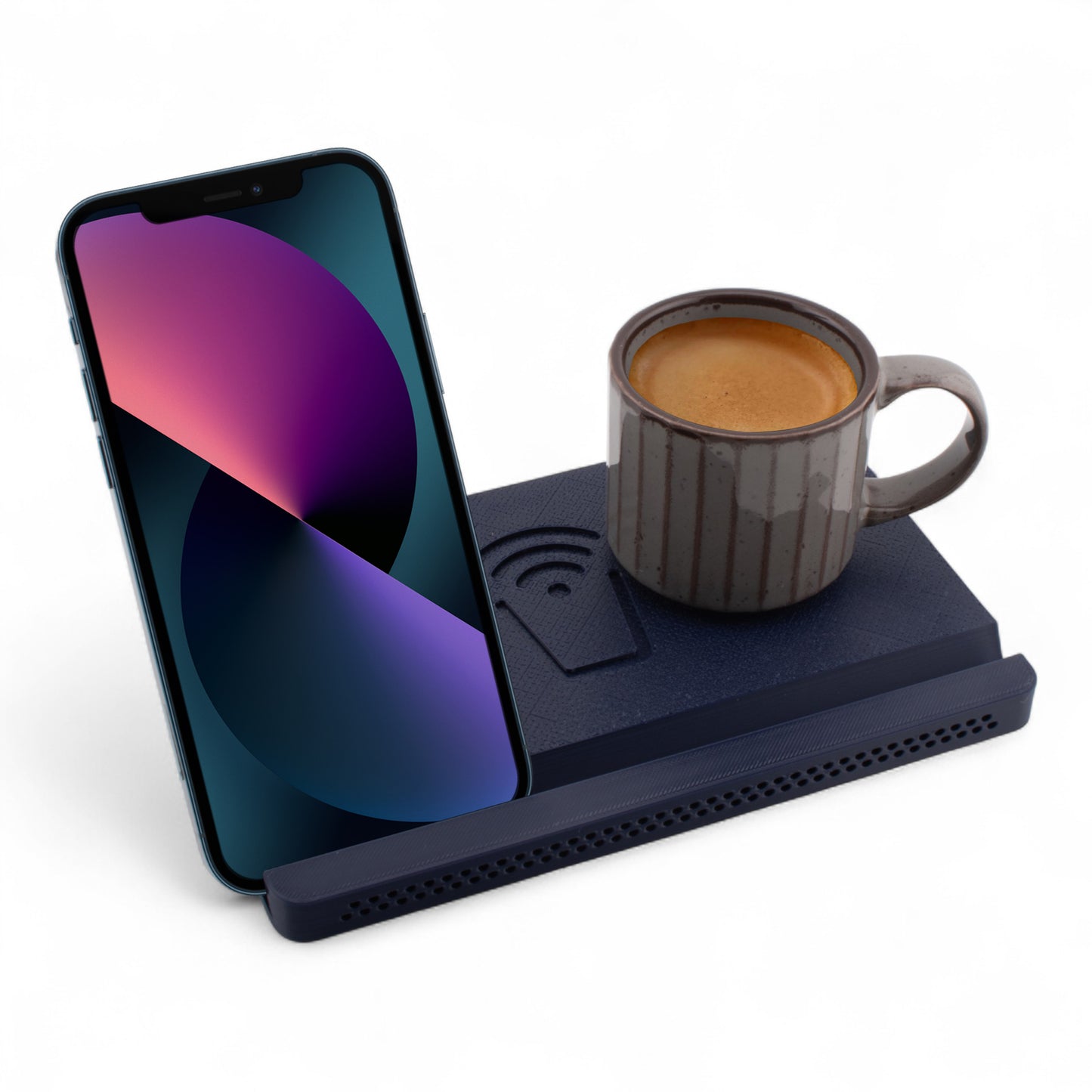 Smartphone and coffee mug on an indigo coaster on a white background right angle