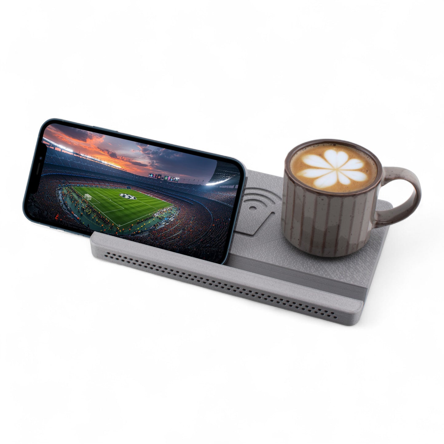 Landscape smartphone and coffee mug on a silver coaster on a white background left angle