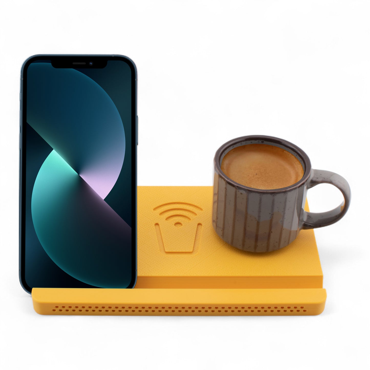 Smartphone and coffee mug on a tangerine coaster on a white background front facing